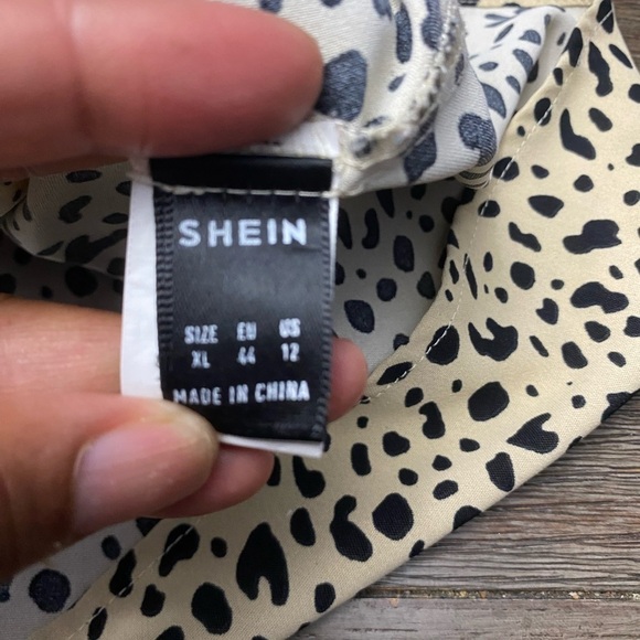 Womens leopard print cap sleeve tunic XL
New without tags - Picture 7 of 9